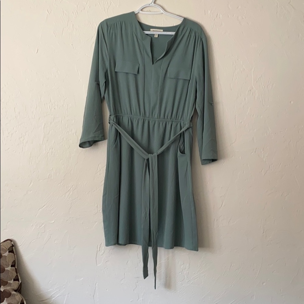 Soft green dress with pockets